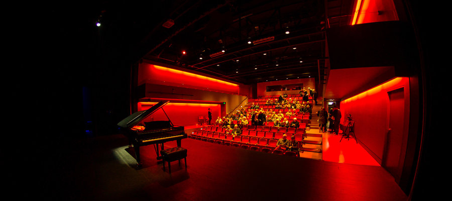 Piano in red theatre Slider Image